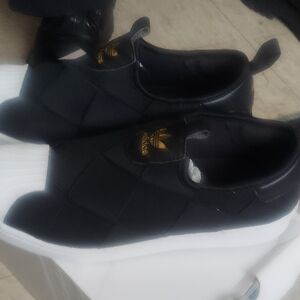 Adidas Men's Black and White Slip-On Sneakers